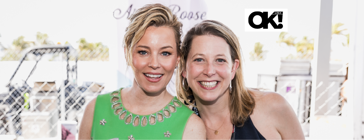 Elizabeth Banks, co-owner and CCO of Archer Roose Wines with Marian Leitner-Waldman, co-founder and CEO of Archer Roose Wines featured in OK! Magazine at South Beach Wine and Food Festival