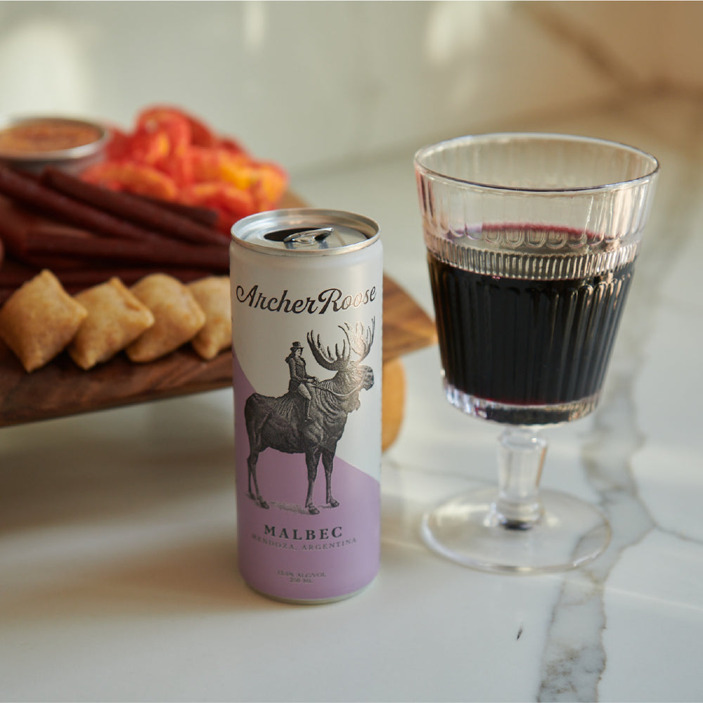 
                  
                    Archer Roose Malbec Wine in a Can on a reflective surface | Archer Roose Wines | Wine in a Can | Canned Wine | Luxury Wine. In Cans | Malbec
                  
                